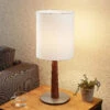 Lucande Larkira Stoff-Tischlampe, Holz, Rund, 25cm 1 Lucande Larkira Stoff-Tischlampe, Holz, Rund, 25cm -Lucande 9628394