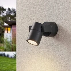 Lucande Außenwandstrahler Kavuna, Dunkelgrau, IP54, Rund 12 Lucande Außenwandstrahler Kavuna, Dunkelgrau, IP54, Rund -Lucande 9969117 1